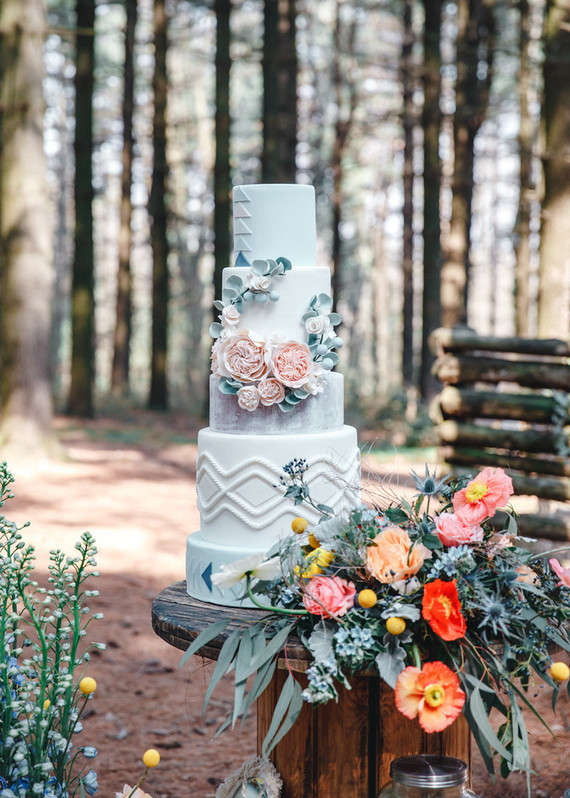 The wedding cake was a textural geometric one decorated with sugar and real blooms