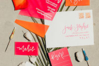 07 The wedding invitation suite was done in orange and pink, all modern to match the shoot