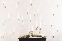 07 a beautiful and airy white and gilded feather backdrop is a chic ethereal idea  for any wedding