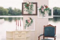 07 a peaceful lake photo booth with frames, blooms, a vintage dresser, candles and a blue chair