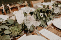 08 The wedding tablescape showed off a fresh greenery runner with blush blooms and floral table names