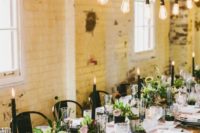 08 a stylish industrial wedding reception with bulb strings over the tables for more light