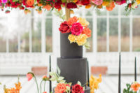 09 The main wedding cake was handpainted and adorned with sugar flowers in bold colors