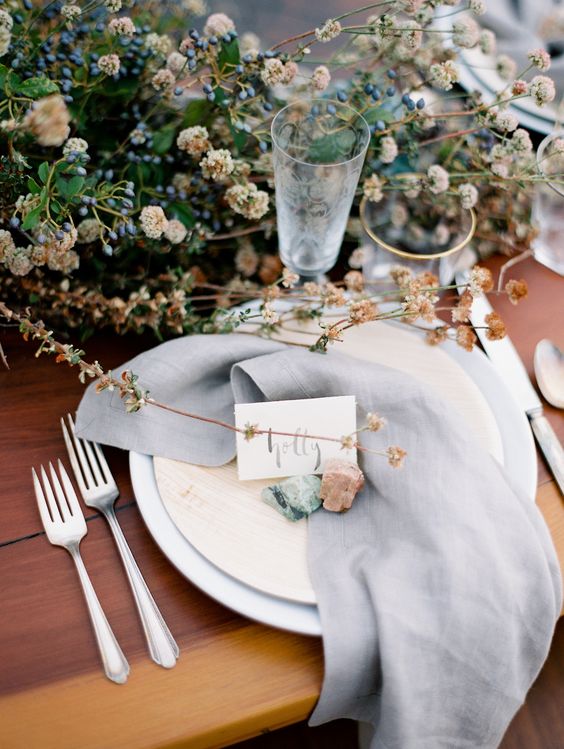 dried blooms, berries, herbs and rocks are right what you need for organic modern table decor