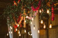 10 gorgeous overhead wedding decor with fresh greenery, colorful flower garlands and bulbs hanging down