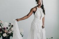 12 A lace halter neckline wedding dress with a train is ideal for a boho bride