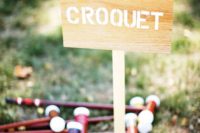 12 croquet is a timeless idea for any outdoor wedding, use colorful accessories