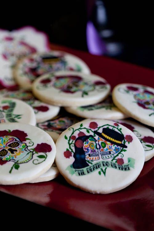 hand painted sugar skull wedding cookies is atasty favor idea and a delicious dessert