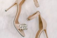 12 nude ankle strap heels with heavily embellished straps is summertime classics