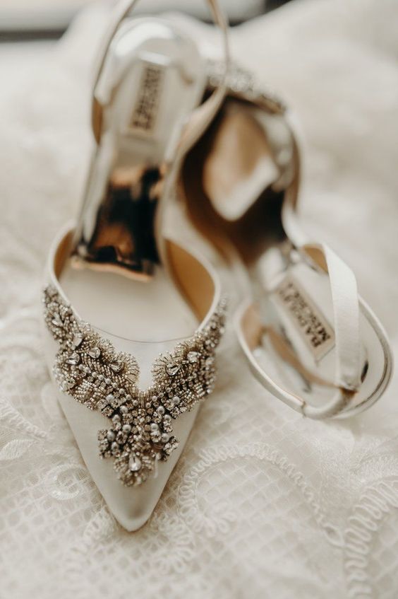 off-white pointed toe heavily embellished wedding heels will add a refined touch to your look