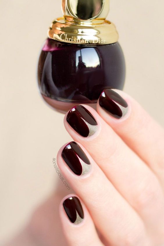 burgundy and silver glitter nail design is a chic idea both for fall and Halloween weddings
