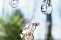 14 hanging bulbs as little vases for cherry blossom to decorate your wedding venue