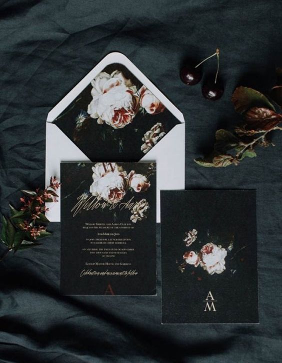 edgy dark floral wedding invitations with a white envelope for a contrast and an elegant feel