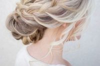 17 a chic braided halo with a low bun and waves down is great for a rustic or boho bridesmaid