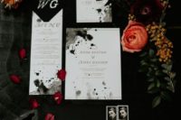 17 ink splatter modern black and white wedding invitation suite with gold calligraphy for a modern haunted wedding