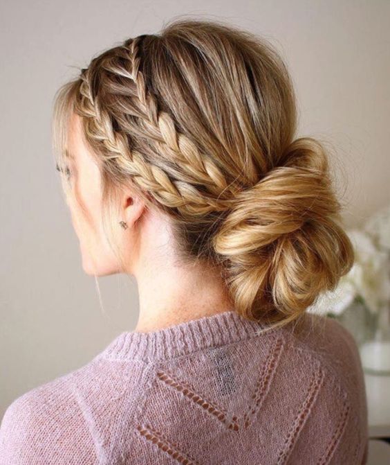 a double braided halo with a low twisted chignon guarantees a picture perfect look for the whole day