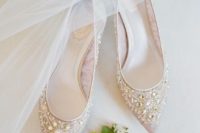 23 nude pointed toe heavily embellished flats are a chic option for any wedding