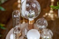 25 an industrial wedding centerpiece of vintage bulbs and blooms will add enough light to the space