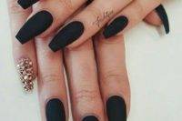 25 black matte nails with a single jeweled nail to make a bold statement for a Halloween wedding