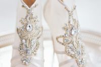 25 peep toe sheer bejeweled booties with heavy embellishments look very glam-like