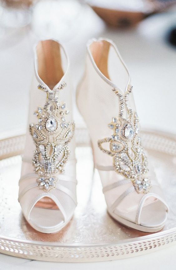peep toe sheer bejeweled booties with heavy embellishments look very glam-like