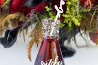 26 serve cocktails in test tubes with sparkles and add calligraphy like here – Witches’ Brew
