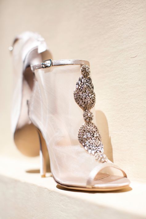 sheer peep toe wedding booties with large embellishments for a fashion-forward bride