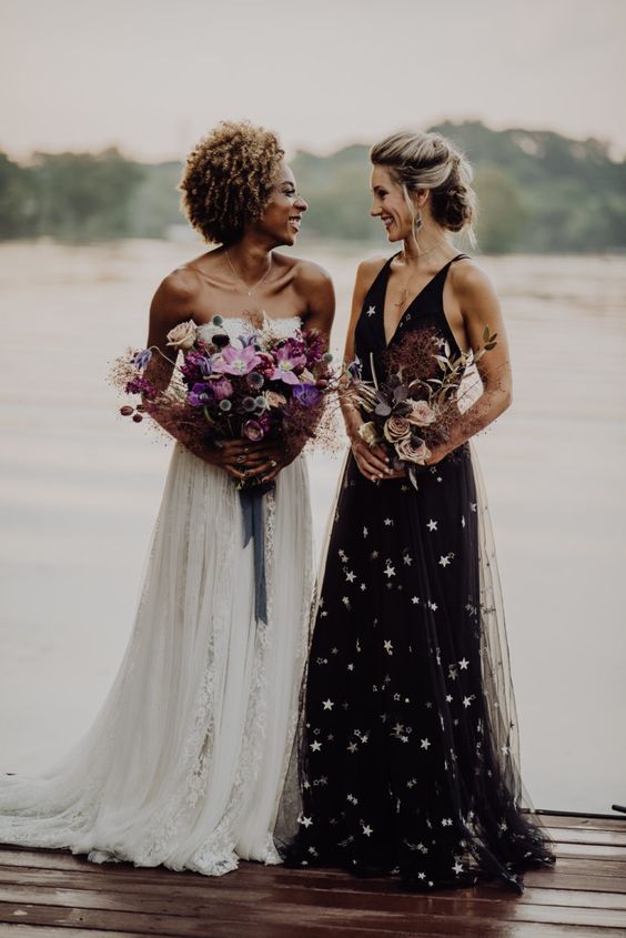 a black strap V-neckline maxi bridesmaid dress with stars is a super cool and chic idea to go for, it will be amazing