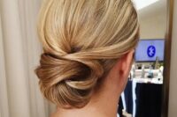 a low twisted chignon looks interesting and non-typical, perfect for an elegant look, it’s great for brides and bridesmaids