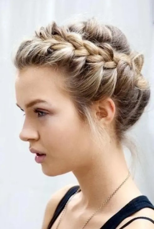 a messy and dimensional braided updo with some locks down is a picture-perfect option that will last long