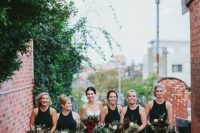 black halter neckline maxi bridesmaid dresses with slits paired with black shoes are elegant