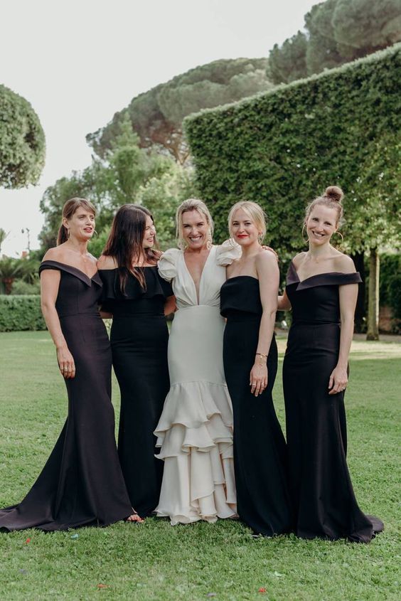 black off the shoulder and strapless mermaid wedding dresses with trains are very refined and chic