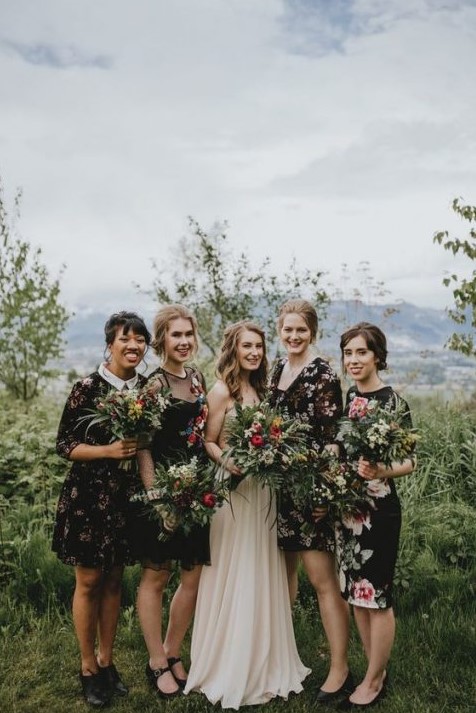 cool mismatching dark floral bridesmaid dresses of various lengths and looks