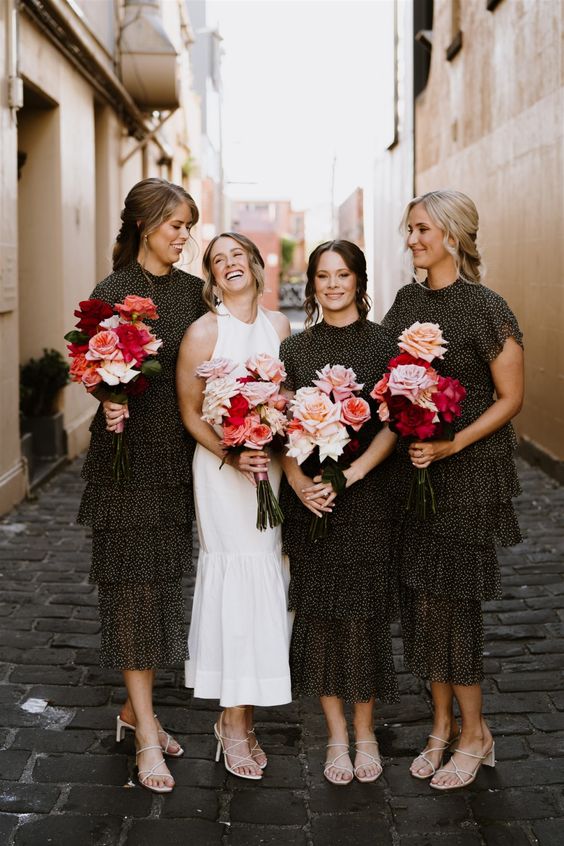 creative midi black ruffle bridesmaid dresses with high necklines and short sleeves, white strappy shoes and bold bouquets are amazing