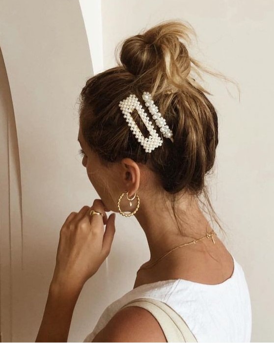 faux pearl hair clips like these ones combine two trends in one - pearls and hair clips