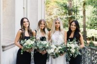 matching black mermaid maxi bridesmaid dresses with straps and with small trains are grear for a modern boho wedding