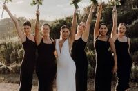 matching black midi bridesmaid dresses with thick straps, white strappy shoes are perfect for a modern or minimalist wedding