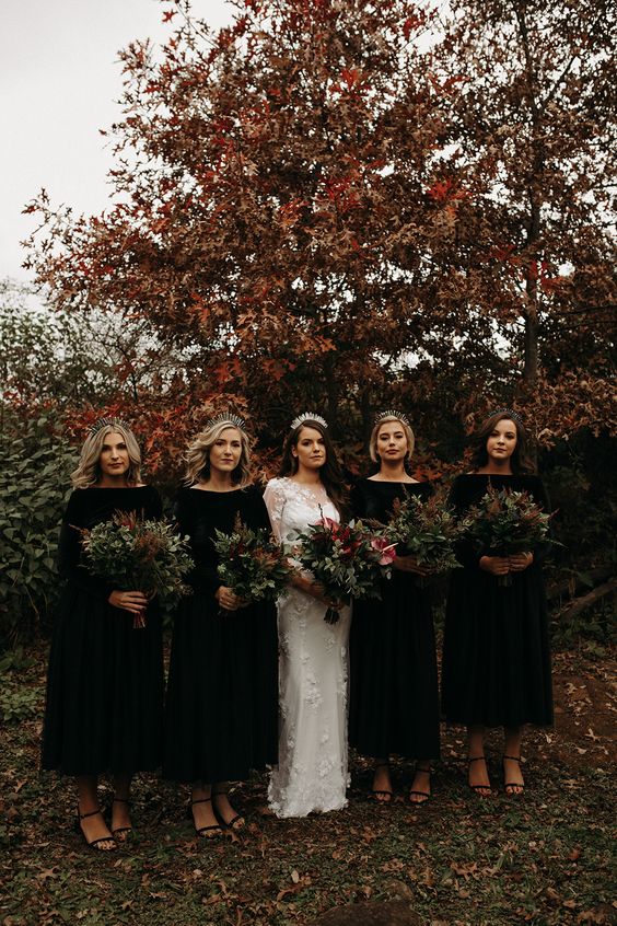 midi black bridesmaid dresses with bateau necklines and long sleeves, black shoes for a moody fall wedding