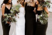 mismatching black black midi bridesmaid dresses with black strappy shoes are perfect for a boho wedding