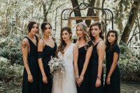 mismatching black maxi bridesmaid dresses are a gorgeous idea for a dark and moody fall wedding