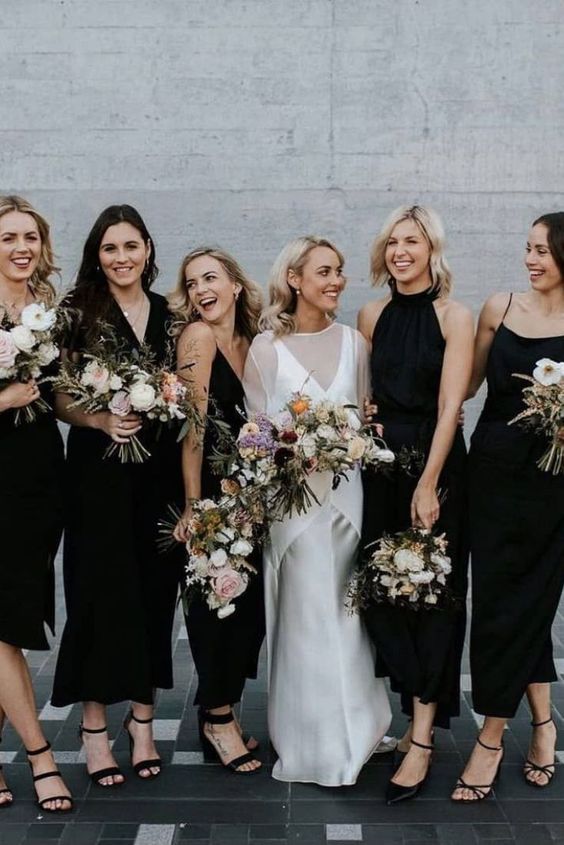 mismatching black midi bridesmaid dresses, black shoes for a stylish modern bridal party look, it's a great idea