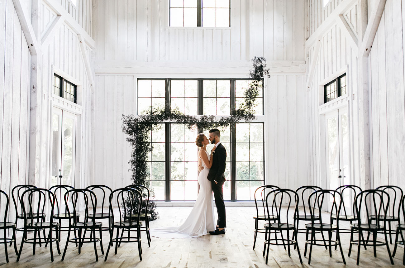 This wedding in black and white is hip, edgy and fashion forward, which isn't usual for a barn wedding