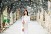 02 The bride was wearing a neutral lace wedding dress with long sleeves and a turtle neck by Costarellos
