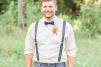 groom’s look with suspenders