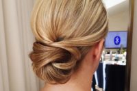 02 a chic tight low bun with twists will last all day long and will fit even the most formal style