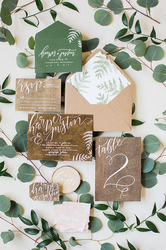 a rustic wedding invitation suite made of recycled paper completely can be catchy and cool