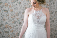 03 The bride was wearing a whimsy lace wedding gown with an illusion neckline and a train
