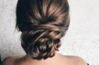 03 a chic twisted low bun with a bump for long hair – you cna rock one even if your hair is very long