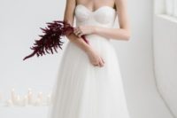 03 a strapless A-line wedding gown with a lace bodice and an A-line  skirt for a modern romantic bride
