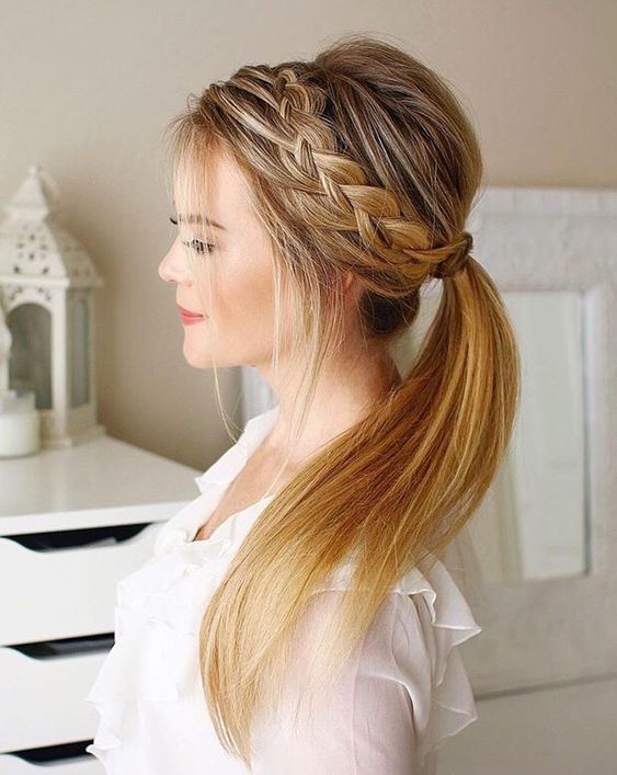a low ponytail with a braided halo and locks down is a simple and cool idea to rock